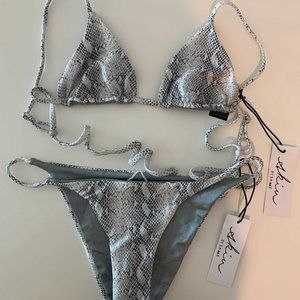 Skin by Same Los Angeles Python bikini top.